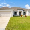 Photo 1: House front
