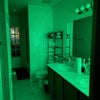 Photo 4: The shared bathroom with our green lighting