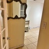Photo 5: Entrance to smaller room