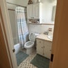 Photo 4: Shared full bath upstairs in hall