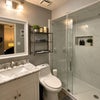 Photo 2: Shared full size shower bath