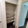 Photo 4: Outside storage closet across from bathroom