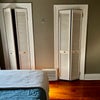 Photo 3: two closets in bedroom with overhead storage