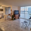 Photo 2: Shared Living Room, Kitchen, and Dining area