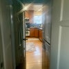 Photo 6: View from bathroom to laundry room to kitchen