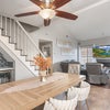 Photo 4: Kitchen Table + Bar with custom fridge