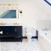 Photo 9: Master bathroom tub with skylight