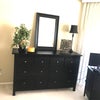 Photo 4: Bedroom dresser which now has a 46” Smart TV instead of mirror.  Mirror placed elsewhere.