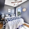 Photo 2: This is a photo of the room when it was staged.