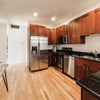 Photo 7: Modern kitchen with all amenities