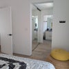 Photo 8: Guest room closet and bathroom hall