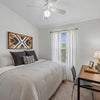 Photo 5: Official model bedroom; finishes may vary.