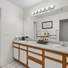 Photo 6: Official model bathroom; layout and finishes may vary.