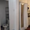 Photo 6: Toilet in a small room and shower stall in the kitchen