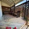 Photo 5: Covered patio with seating