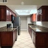 Photo 6: Kitchen-granite countertops