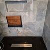 Photo 3: View of Master Shower and fold out chair