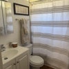 Photo 3: bathroom complete with new towels, shower curtain and soap!