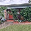 Photo 2: Front entrance and porch