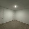 Photo 7: Larger Bedroom 12x13