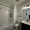 Photo 9: Private Bath (Smaller Bedroom)