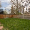 Photo 7: Fenced yard with dog door