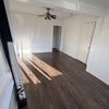 Photo 1: Spacious Private Room with Beautiful Hardwood-Style Flooring
