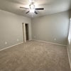 Photo 2: Available room, looking at closet (from entrance)