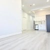Photo 8: Living room/Kitchen