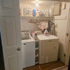 Photo 3: Washer and dryer in main hallway