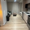 Photo 3: Full Hallway that has kitchen and leads to living room