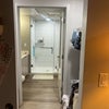 Photo 5: Walk in closet leading to the bathroom