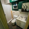 Photo 2: downstairs private bathroom and standing shower 