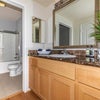 Photo 2: Dresser and bathroom