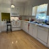 Photo 2: Large, bright kitchen with lots of storage.
