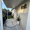 Photo 2: Private entrance and patio area