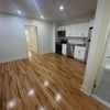 Photo 2: Shared Living Room Space