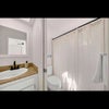 Photo 8: Shared hallway bathroom with dual sink