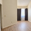 Photo 2:     21-foot room length with high ceilings and natural light