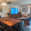 Photo 4: Dining room table and living room