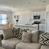 Photo 1: Shared living and kitchen space 
