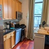 Photo 2: Kitchen area