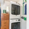 Photo 9: In unit washer and dryer