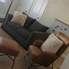 Photo 4: Furniture, artwork, arriving...another couch, Massive tv, console soon.
