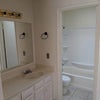 Photo 3: Bathroom and sink area