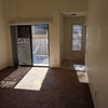 Photo 7: Empty living room (currently furnished)
