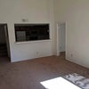Photo 8: Empty living room (currently furnished)