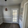 Photo 8: side room off the kitchen, door to porch