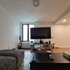 Photo 6: View of the living room from the couch