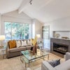Photo 4: Bright Living Room with Cathedral Ceilings